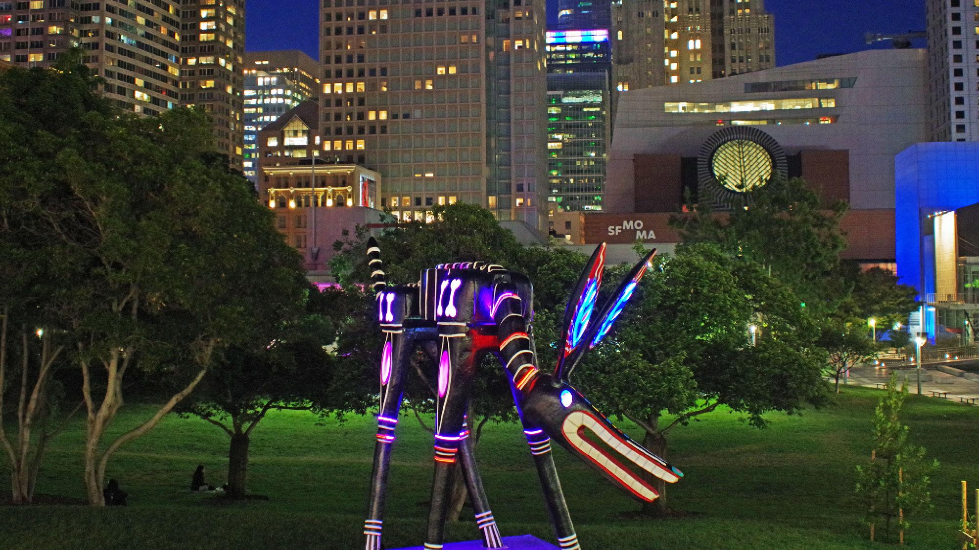 Alebrijes and Nahuales statue statue lit up at night